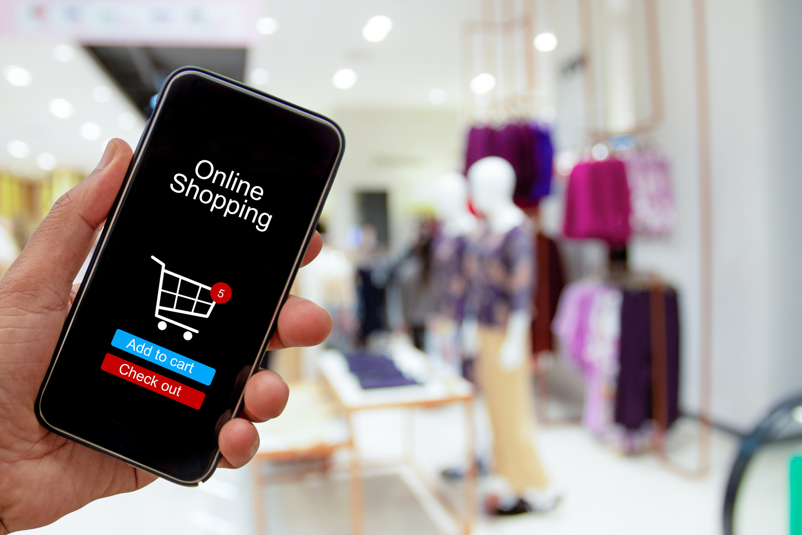 Hand Online Shopping with Smartphone on Mall Background